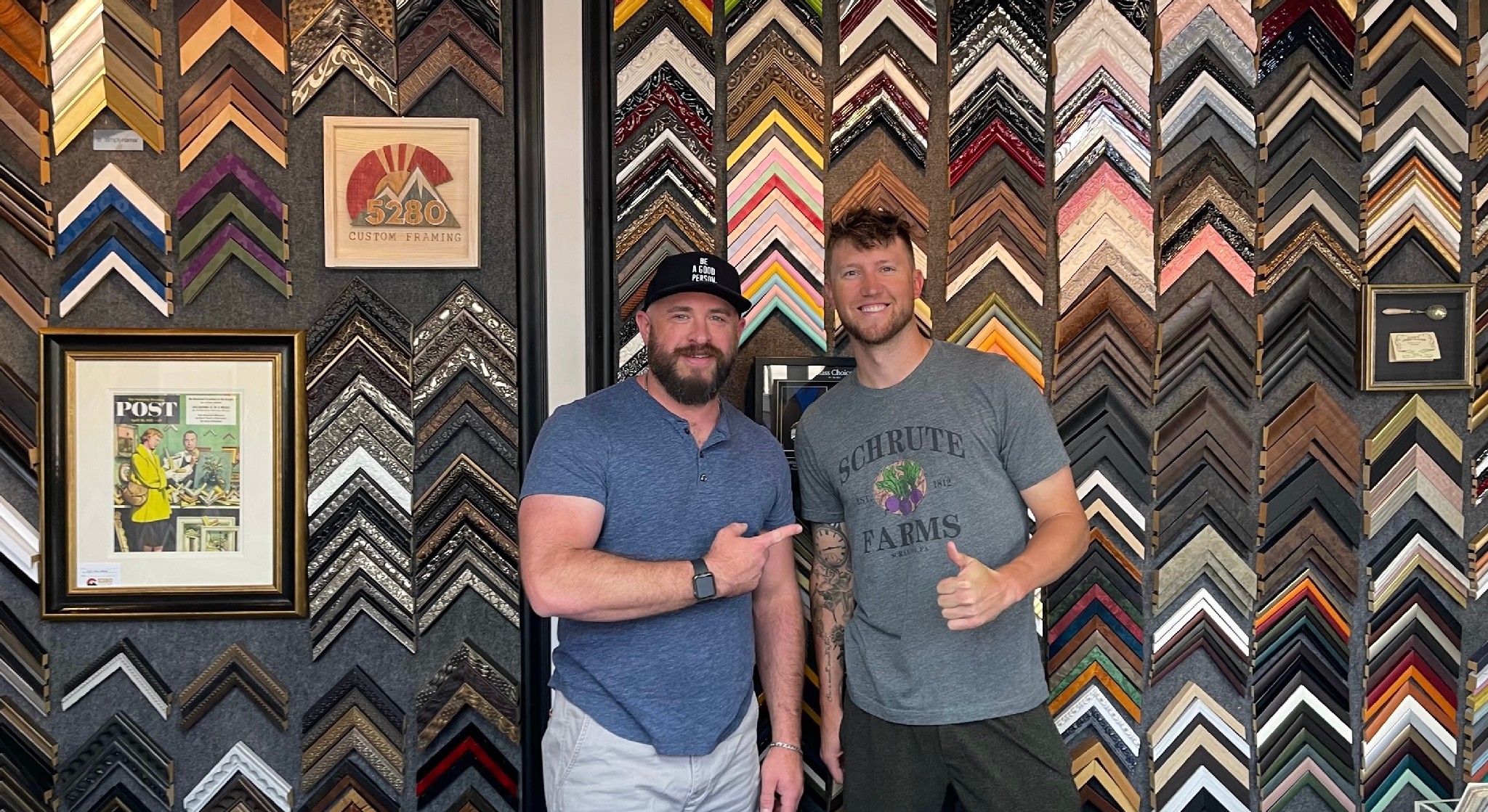 Kyle Freeland picking up a completed custom framing project at 5280 Custom Framing in Denver