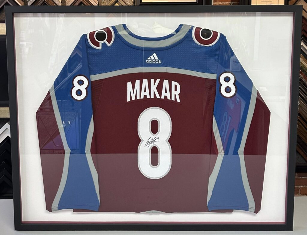 Custom framed Cale Makar jersey