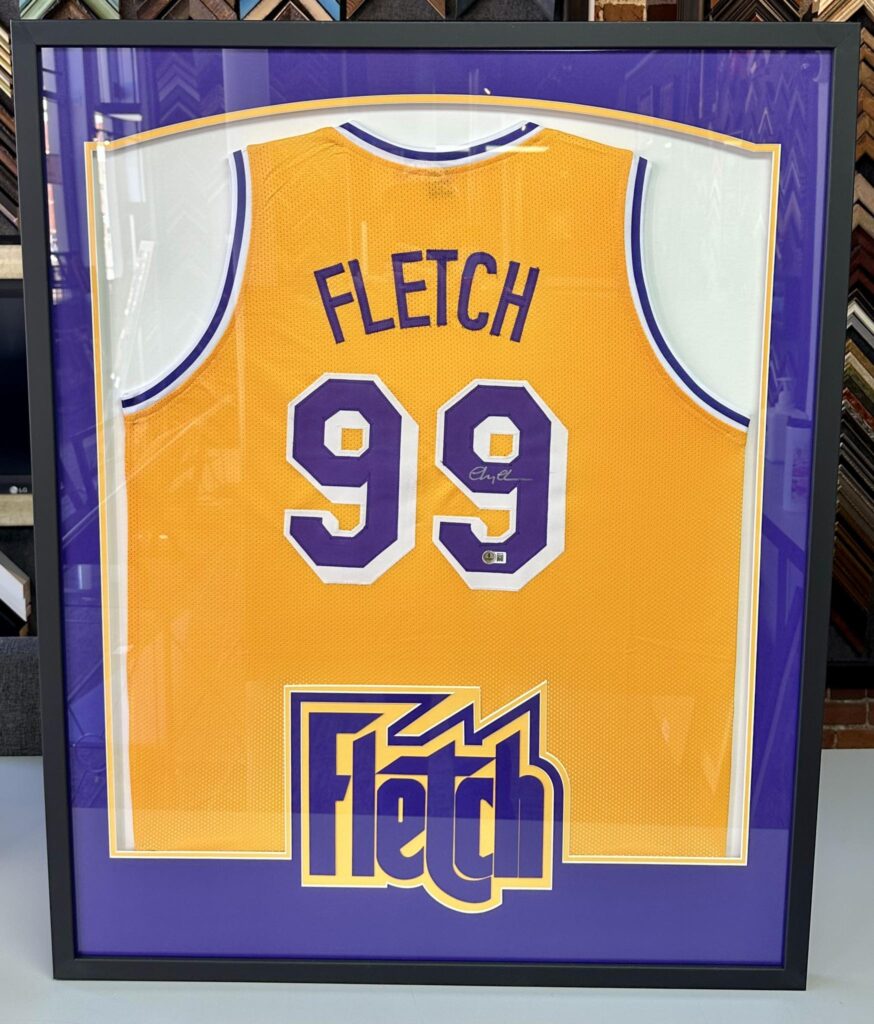 Custom Framed ‘Fletch’ Jersey Signed by Chevy Chase