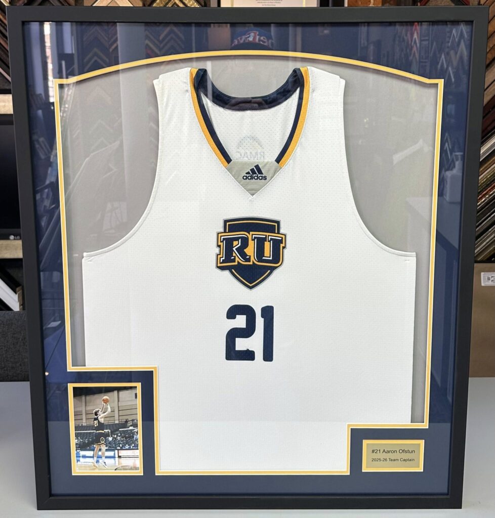 Regis University Men’s Basketball Framed Jerseys